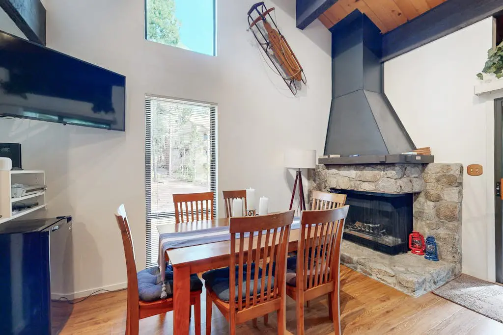 Creekside retreat with pool access, deck, fireplace, and high speed WiFi