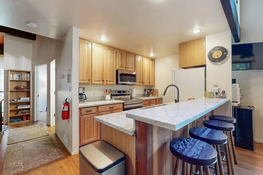Creekside retreat with pool access, deck, fireplace, and high speed WiFi