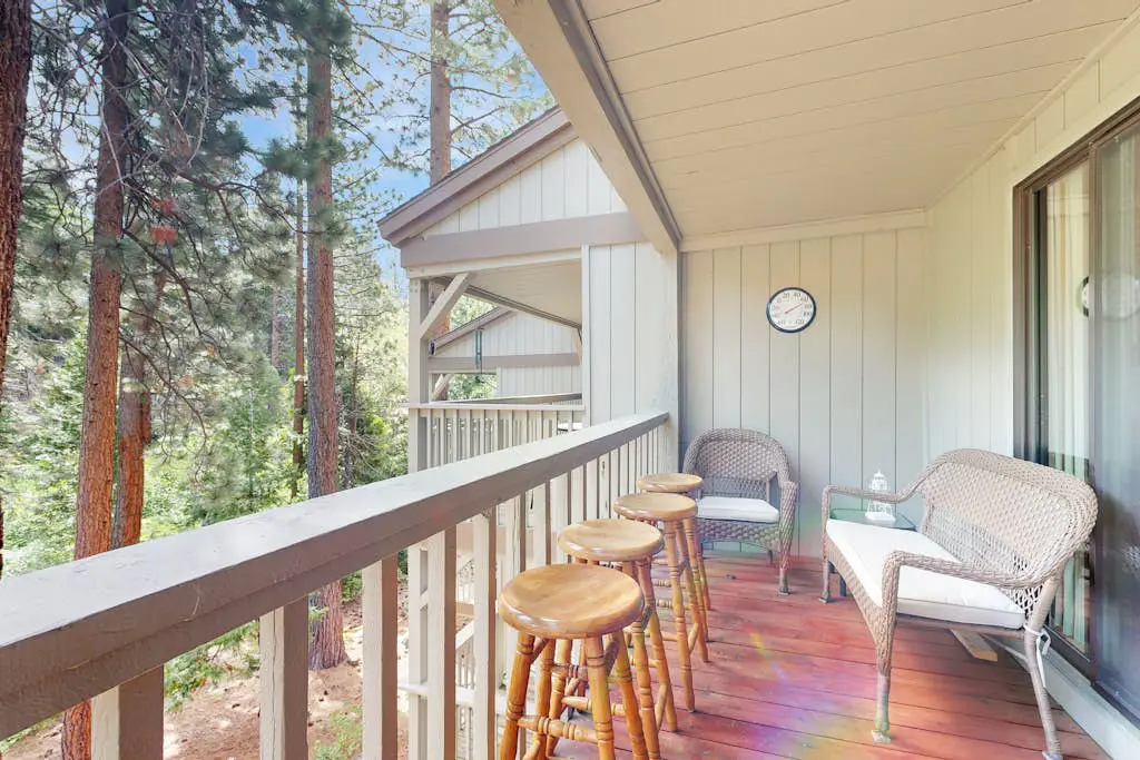 Creekside retreat with pool access, deck, fireplace, and high speed WiFi