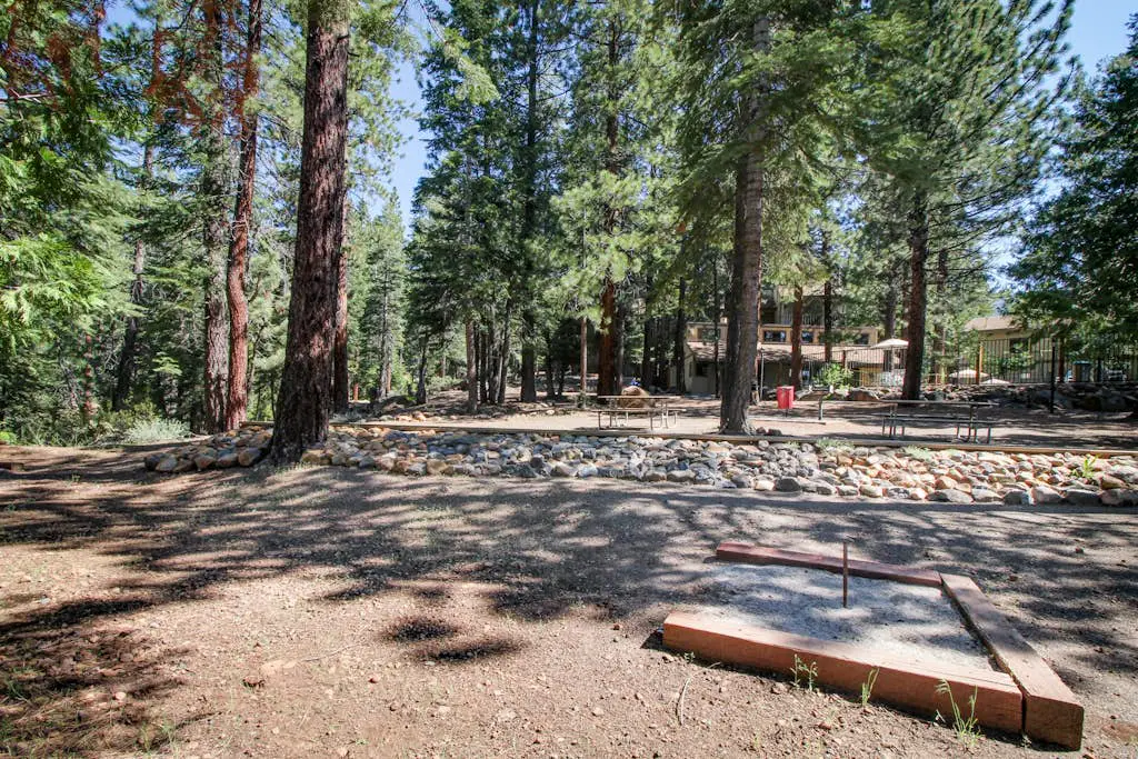 Creekside retreat with pool access, deck, fireplace, and high speed WiFi