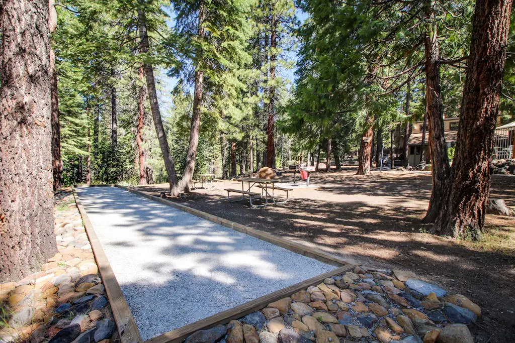 Creekside retreat with pool access, deck, fireplace, and high speed WiFi