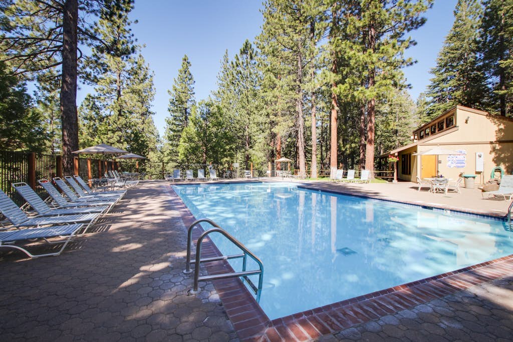 Creekside retreat with pool access, deck, fireplace, and high speed WiFi