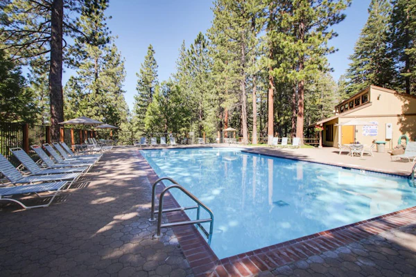 Creekside retreat with pool access, deck, fireplace, and high speed WiFi