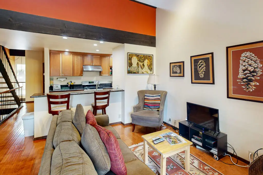 Inviting condo with balconies, fireplace, outdoor pool, sauna, & fitness center