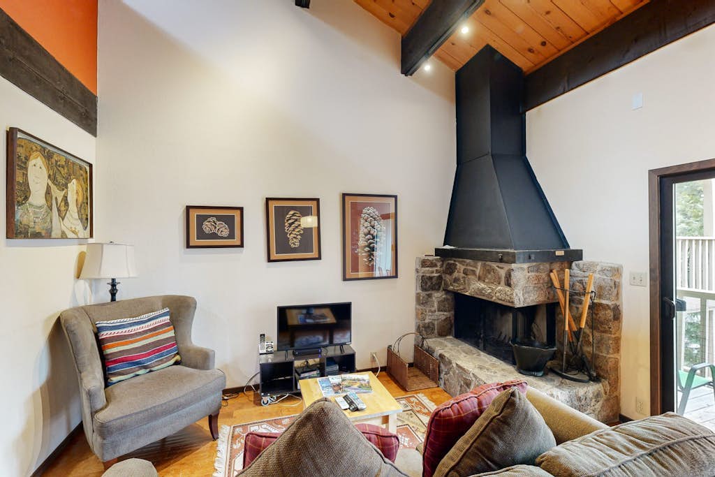 Inviting condo with balconies, fireplace, outdoor pool, sauna, & fitness center
