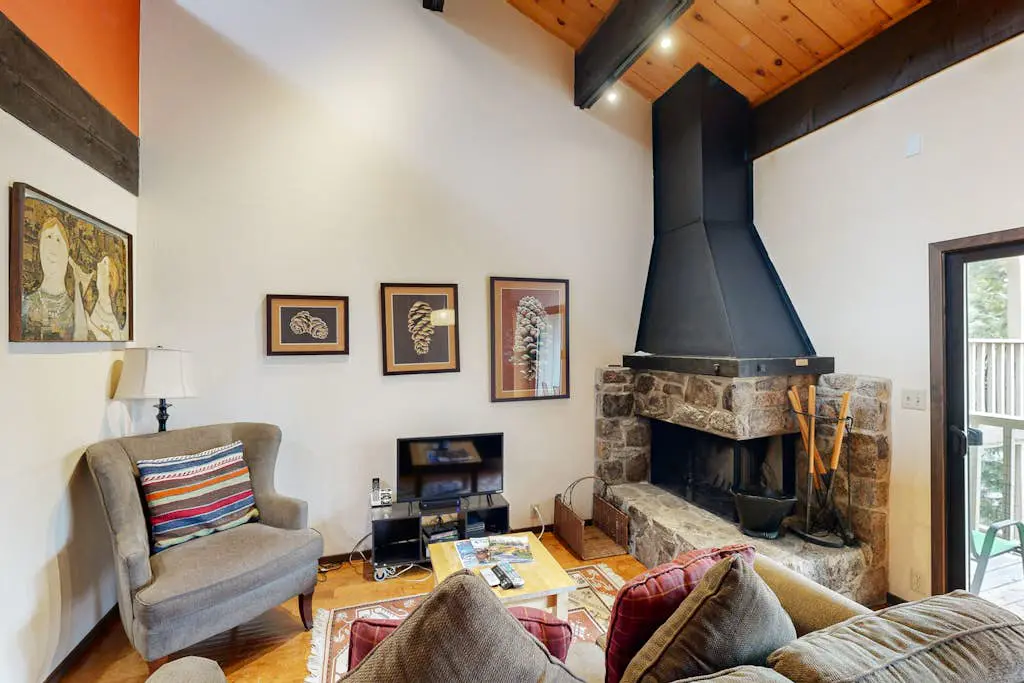 Inviting condo with balconies, fireplace, outdoor pool, sauna, & fitness center