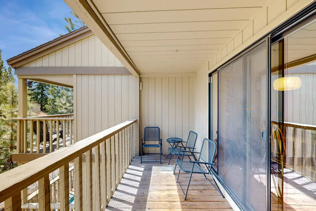 Inviting condo with balconies, fireplace, outdoor pool, sauna, & fitness center