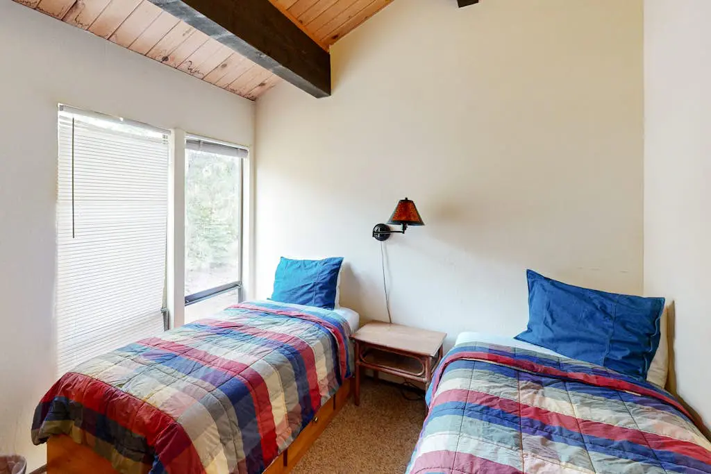 Inviting condo with balconies, fireplace, outdoor pool, sauna, & fitness center