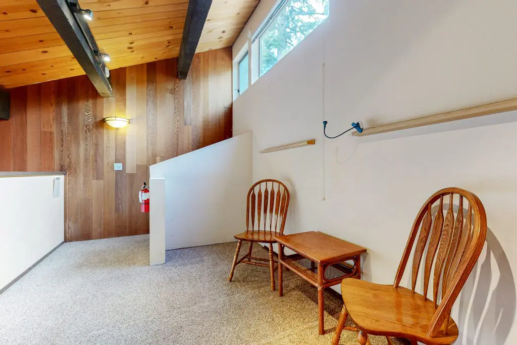 Inviting condo with balconies, fireplace, outdoor pool, sauna, & fitness center