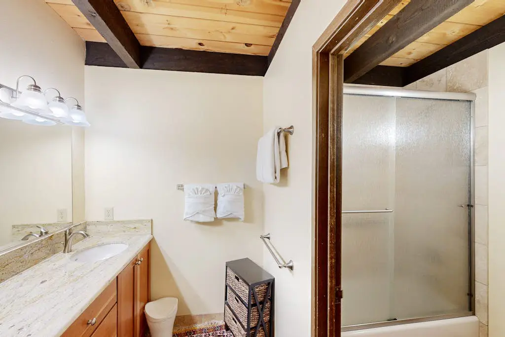 Inviting condo with balconies, fireplace, outdoor pool, sauna, & fitness center