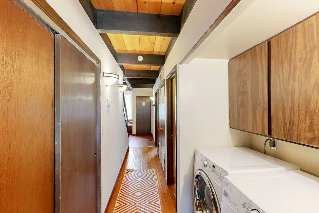 Inviting condo with balconies, fireplace, outdoor pool, sauna, & fitness center