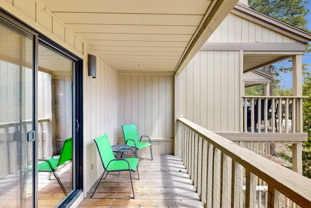 Inviting condo with balconies, fireplace, outdoor pool, sauna, & fitness center