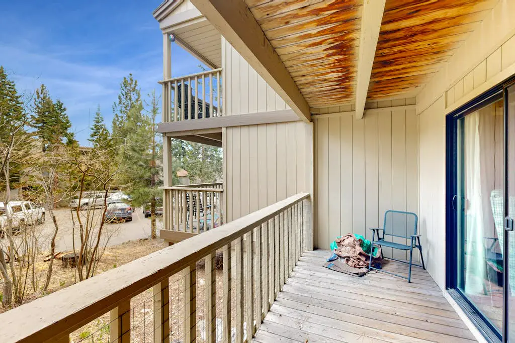 Inviting condo with balconies, fireplace, outdoor pool, sauna, & fitness center
