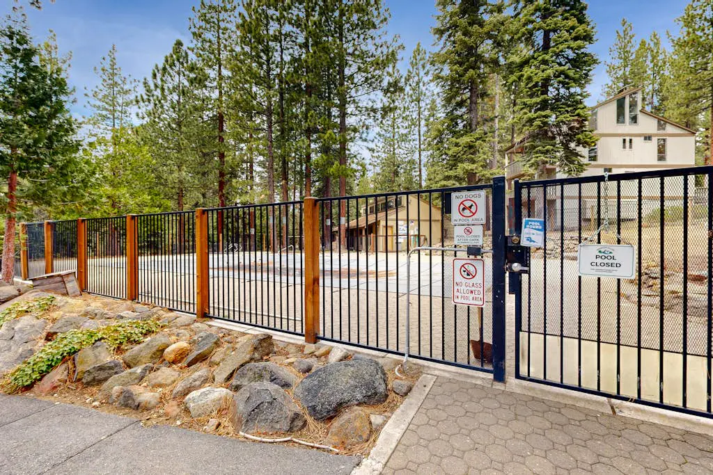 Inviting condo with balconies, fireplace, outdoor pool, sauna, & fitness center