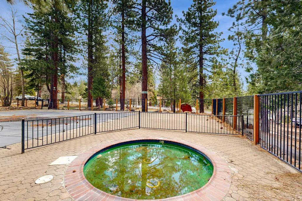 Inviting condo with balconies, fireplace, outdoor pool, sauna, & fitness center