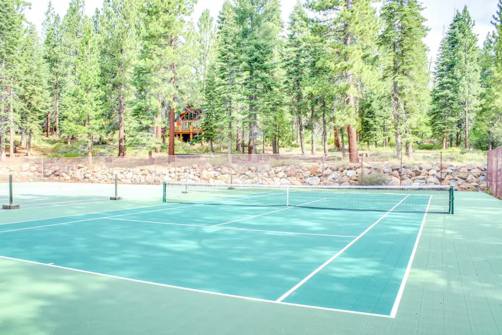Inviting condo with balconies, fireplace, outdoor pool, sauna, & fitness center