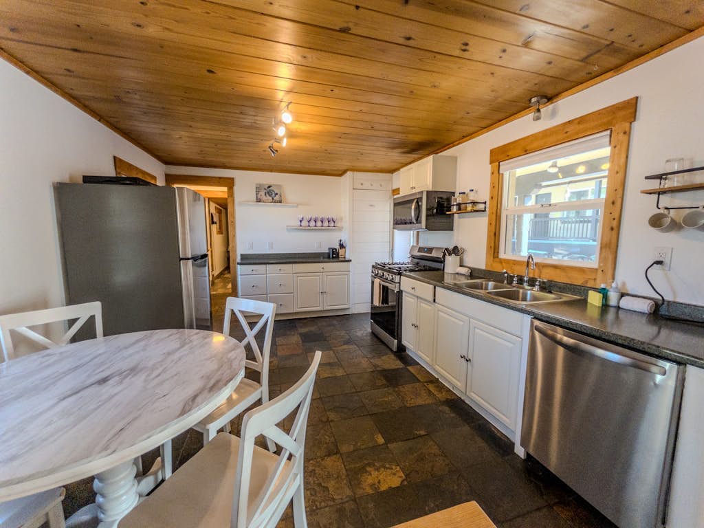 Mountain-side home base with fireplace, WiFi, full kitchen & patio with firepit