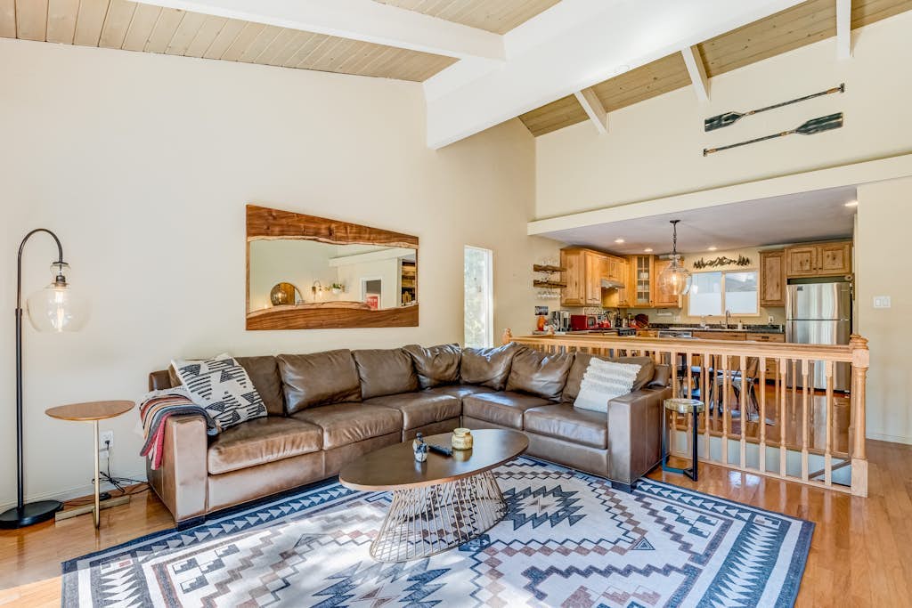 Two-story mountain-view condo with balcony, fireplace & pool - dog-friendly