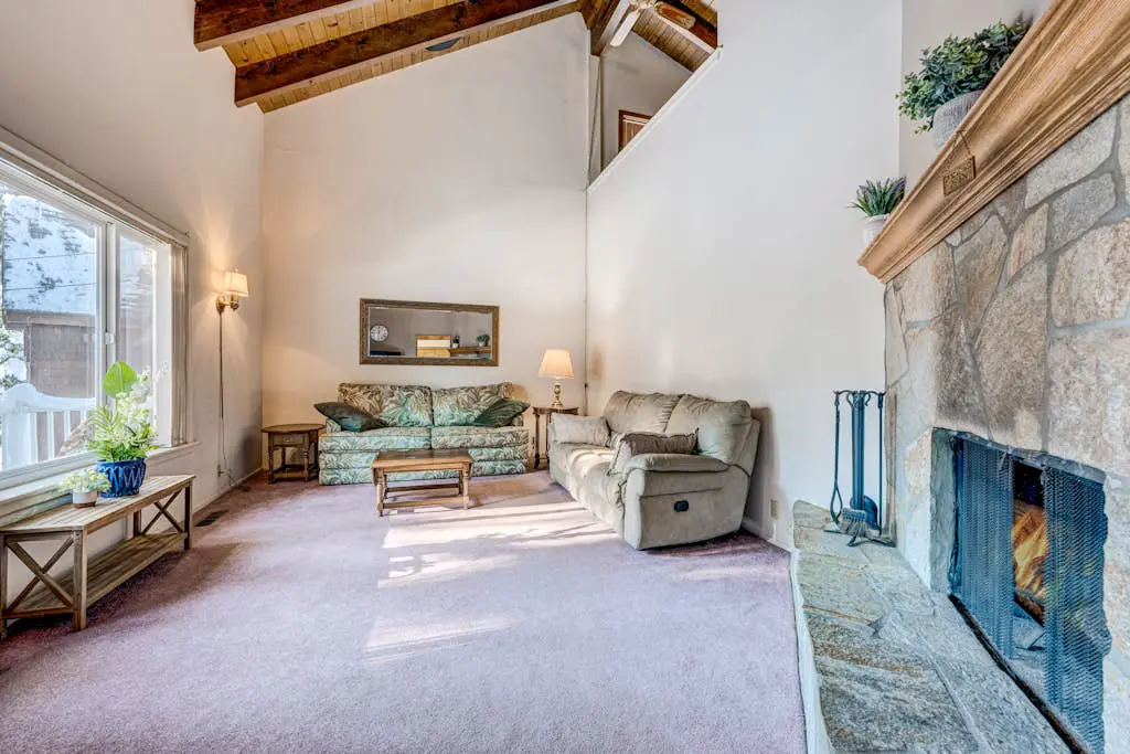 Peaceful retreat with a gas fireplace, balcony, & washer&dryer