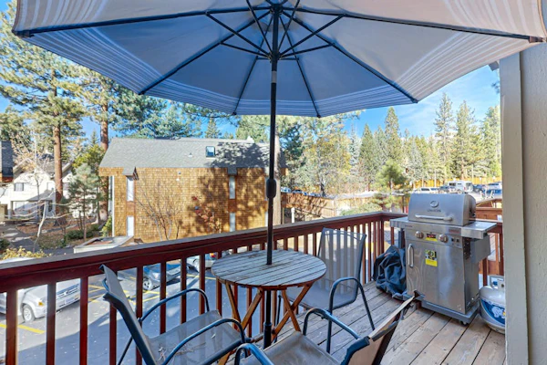 Rustic townhome in a great location with wood stove, grill, balcony, & internet