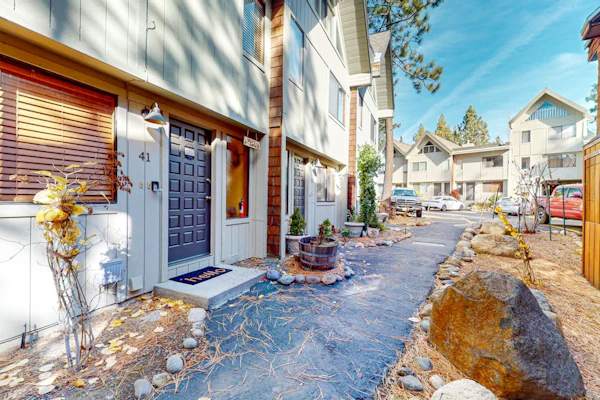 Rustic townhome in a great location with wood stove, grill, balcony, & internet