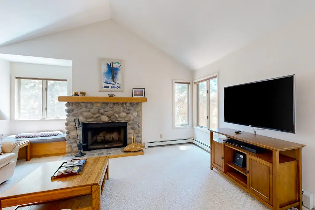 Updated townhouse with deck & fireplace - walk to lake, shopping, and dining
