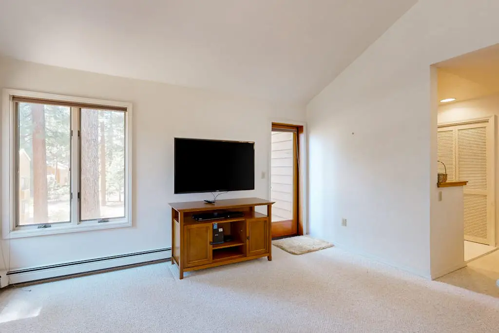 Updated townhouse with deck & fireplace - walk to lake, shopping, and dining