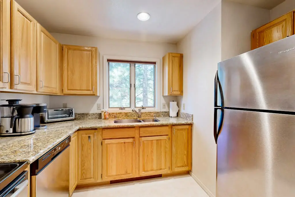 Updated townhouse with deck & fireplace - walk to lake, shopping, and dining