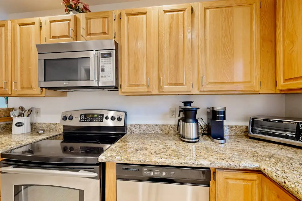 Updated townhouse with deck & fireplace - walk to lake, shopping, and dining