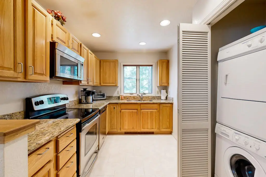 Updated townhouse with deck & fireplace - walk to lake, shopping, and dining
