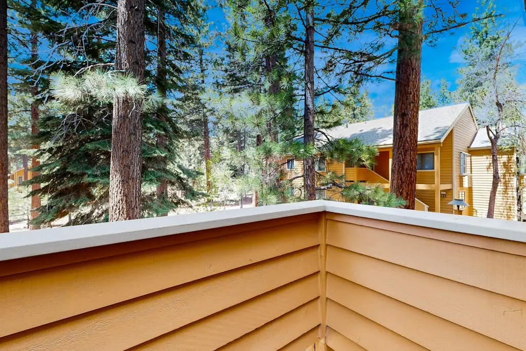 Updated townhouse with deck & fireplace - walk to lake, shopping, and dining