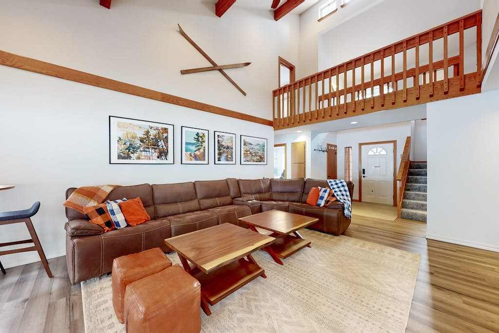 Welcoming lake retreat with private hot tub, games, & fireplace - dog-friendly