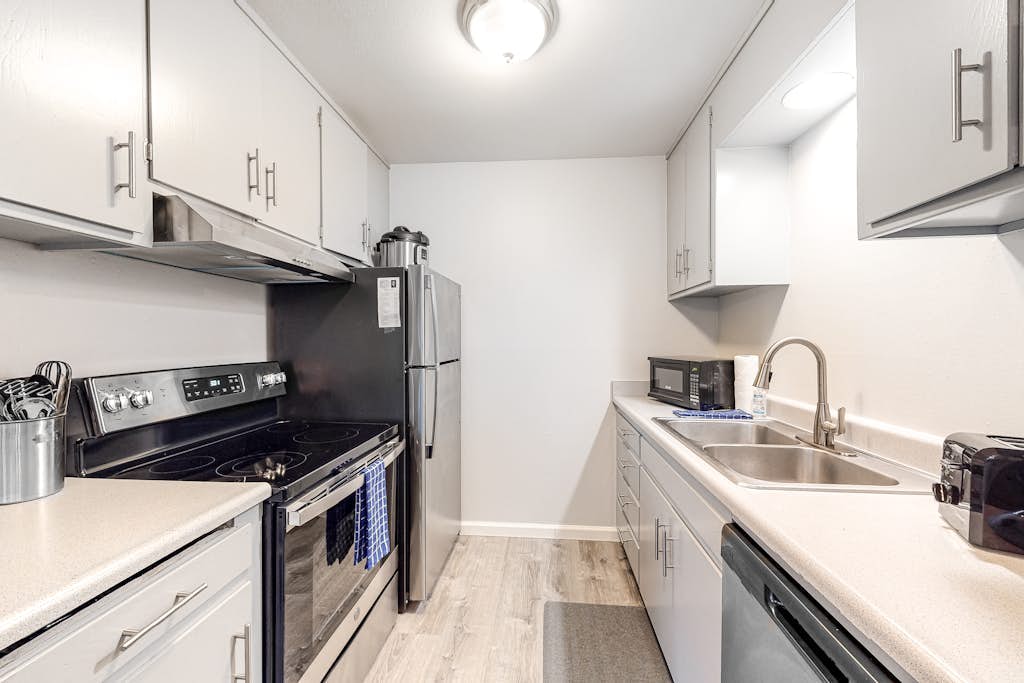 Ground Floor Condo with Free WiFi, Private W/D, and Full Kitchen