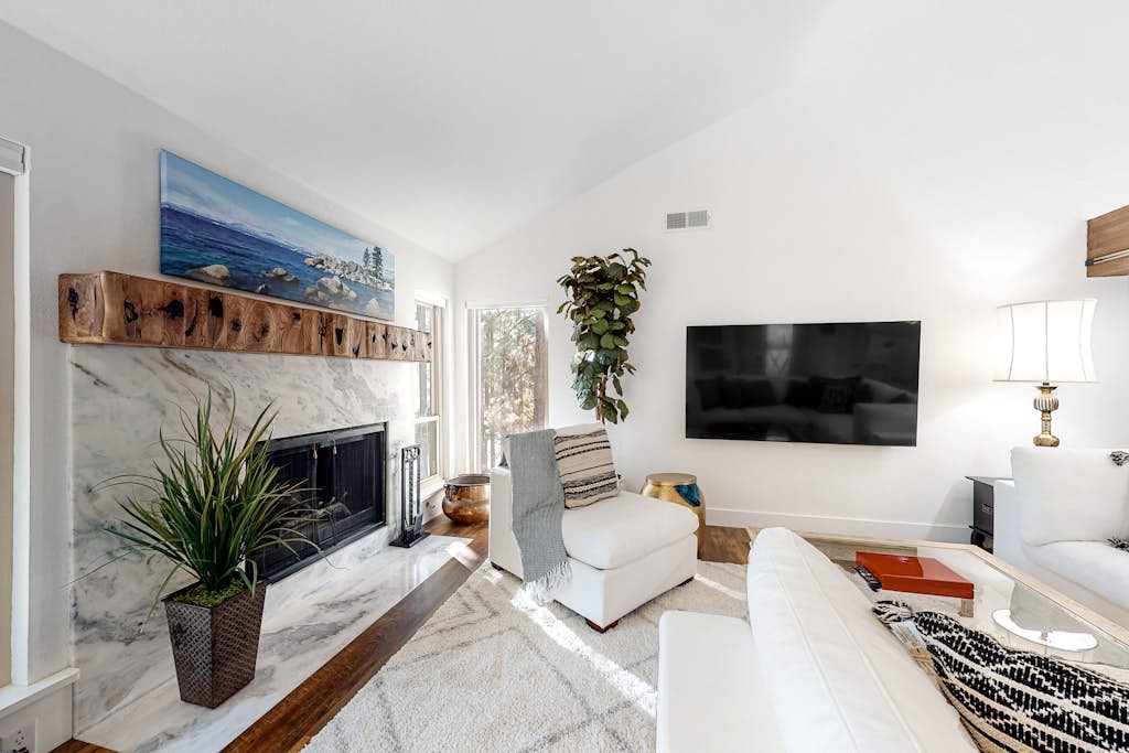 Renovated 2nd-floor condo with deck, grill, fireplace, W/D, & free WiFi