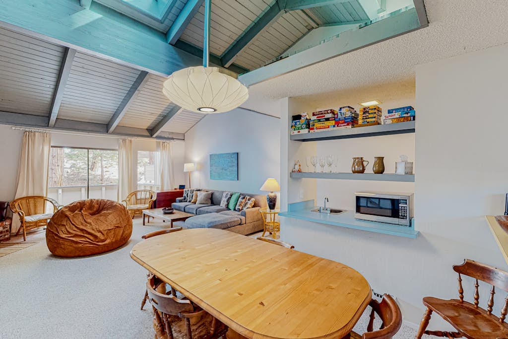 Dog-friendly condo with pool access, fireplace, private washer/dryer, & wet bar