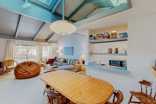 Dog-friendly condo with pool access, fireplace, private washer/dryer, & wet bar