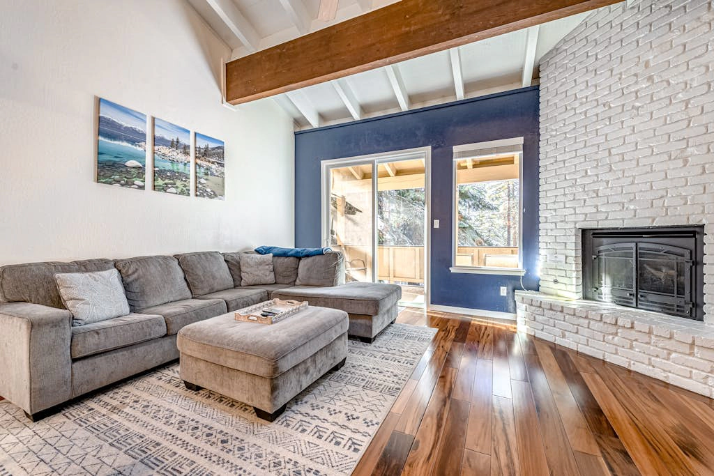 3-story condo with 2 pools, private balcony, grill, & fireplace - near lake & ski