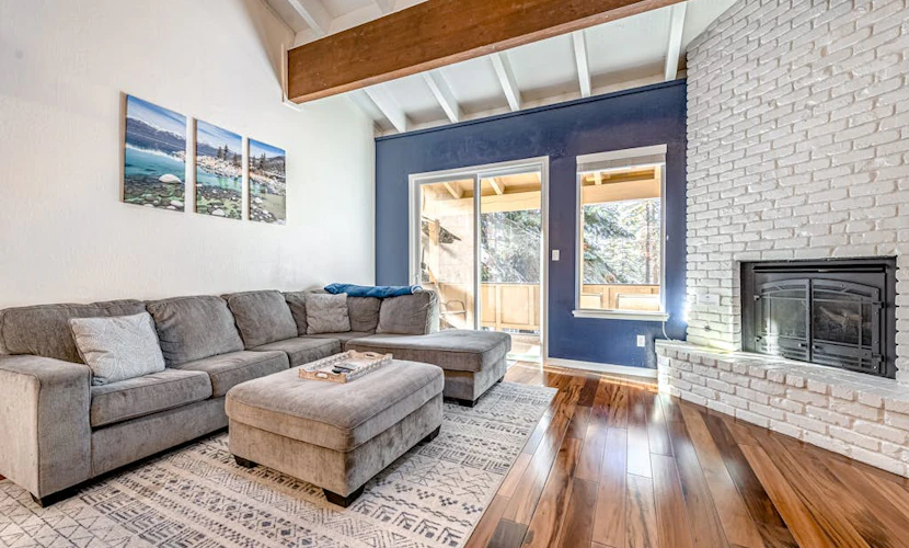 3-story condo with 2 pools, private balcony, grill, & fireplace - near lake & ski