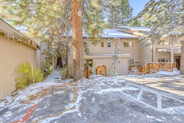 3-story condo with 2 pools, private balcony, grill, & fireplace - near lake & ski