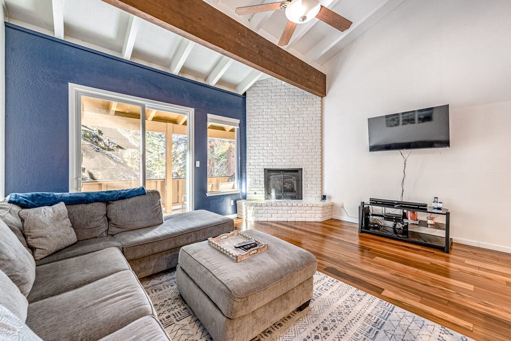 3-story condo with 2 pools, private balcony, grill, & fireplace - near lake & ski