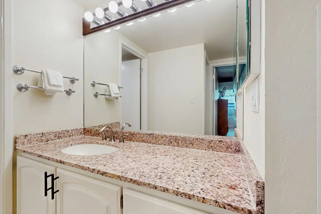 Let reality drift away with the lake view at this townhome with a private beach