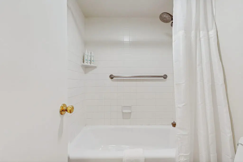 Let reality drift away with the lake view at this townhome with a private beach