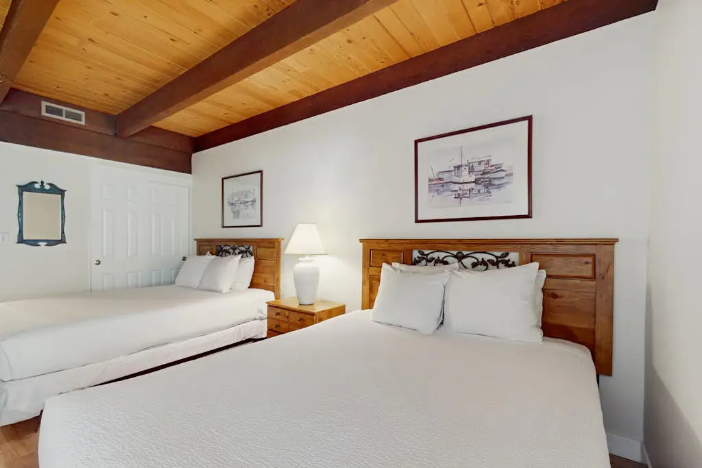 Let reality drift away with the lake view at this townhome with a private beach