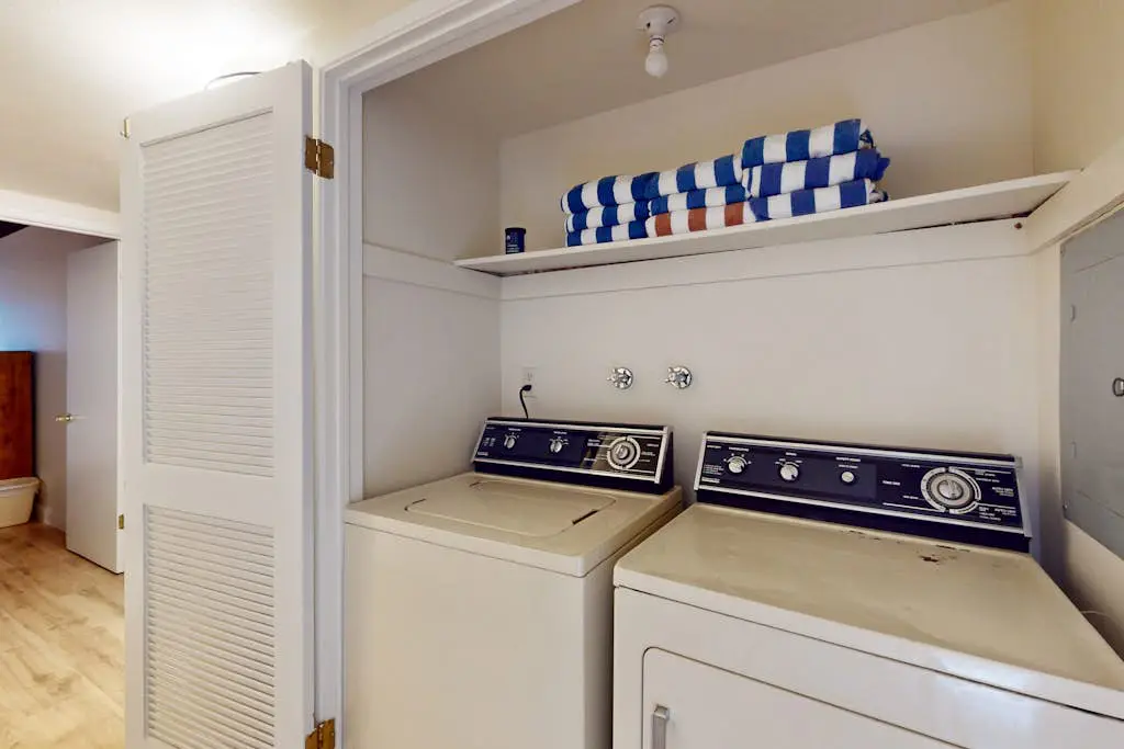 Let reality drift away with the lake view at this townhome with a private beach