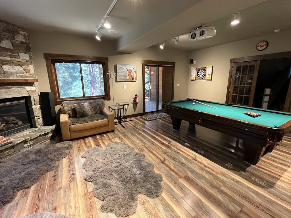 Six-story home among the pines with multiple fireplaces, decks & pool table