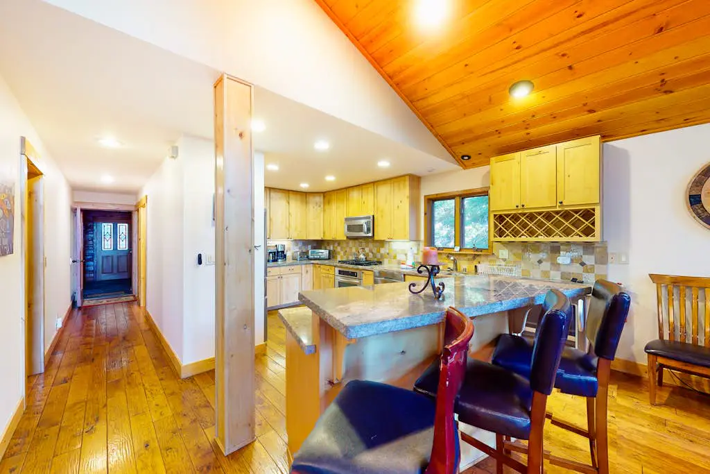 Spacious Home with Gorgeous Forested View, Pool Table, Private Hot Tub & Deck