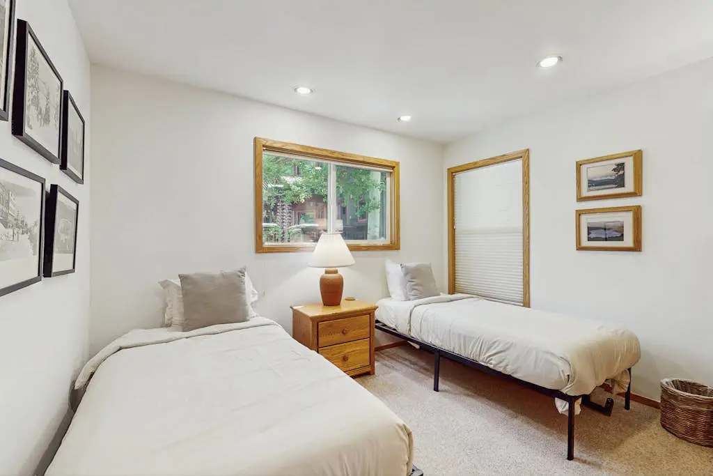 Terrific lakefront gem with private hot tub, dock & beach - near skiing & town