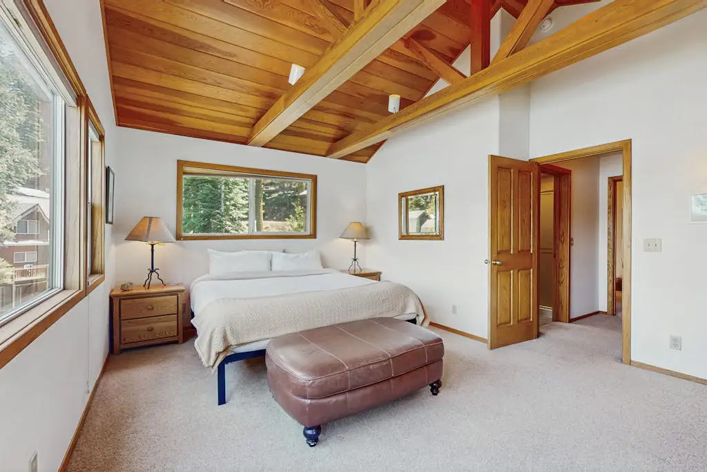 Terrific lakefront gem with private hot tub, dock & beach - near skiing & town