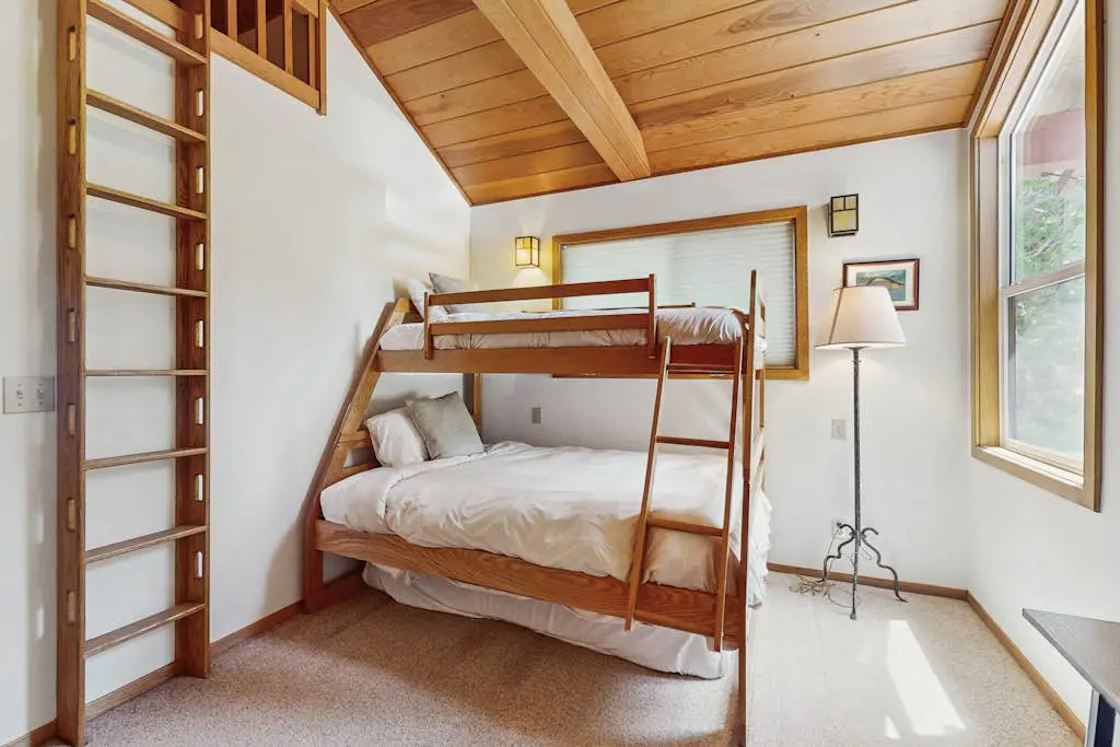 Terrific lakefront gem with private hot tub, dock & beach - near skiing & town
