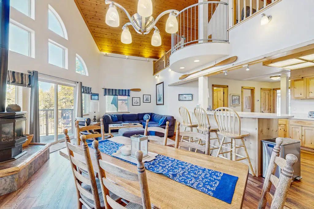 Family-friendly, lakefront getaway with a gas fireplace, furnished deck, & views